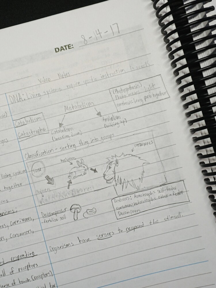 a student notebook for homeschool science opened on a desk