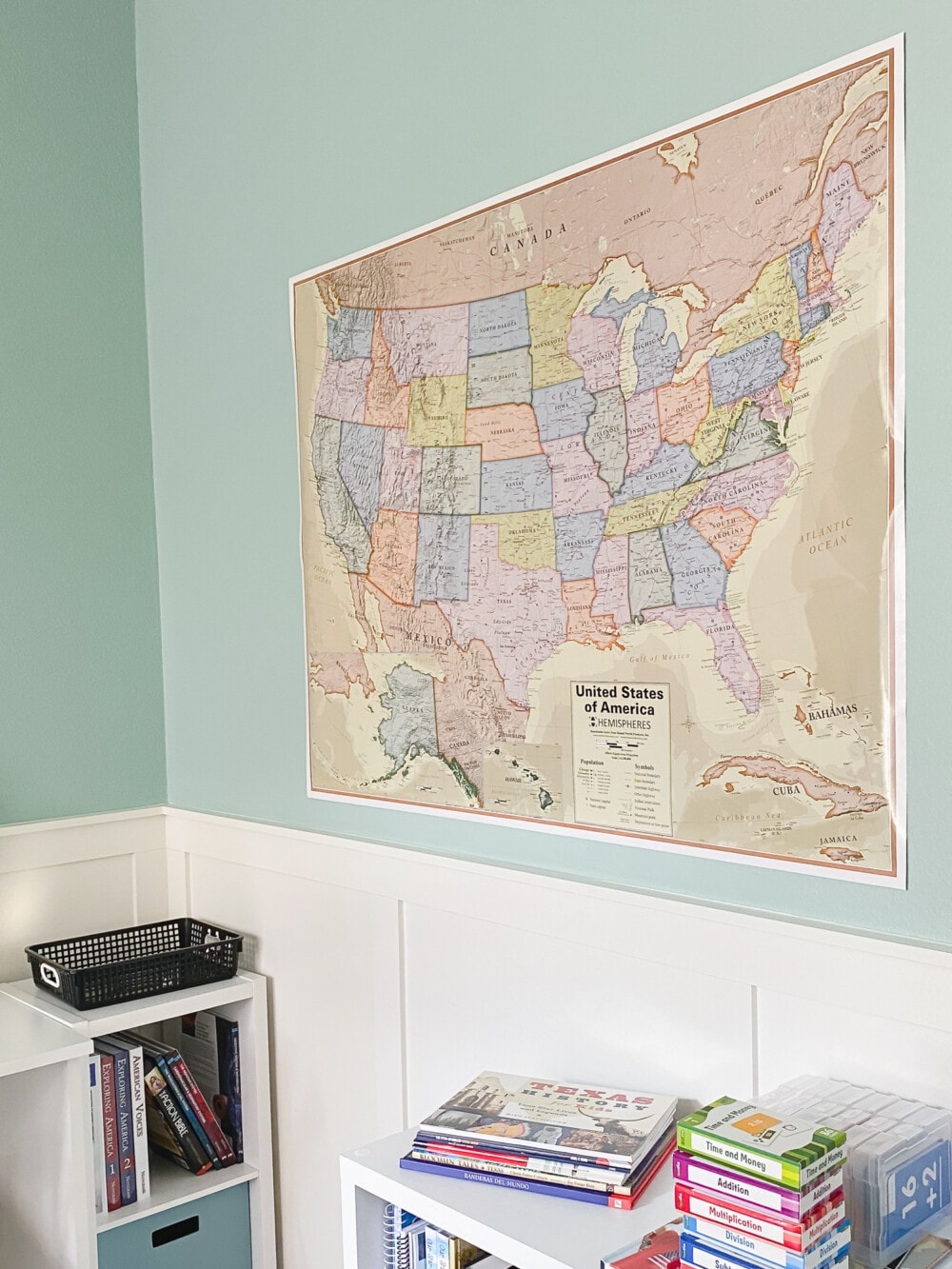 a map of the united states hanging on the wall