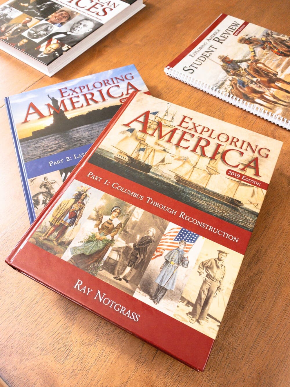 the notgrass exploring america 9th grade american history homeschool curriculum laid out on a table