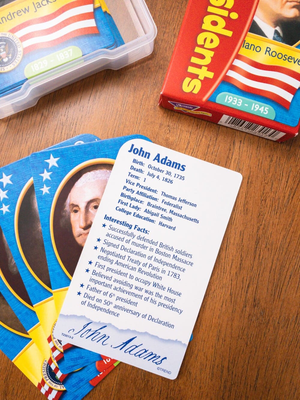 a set of u.s. president flash cards spread out on a table